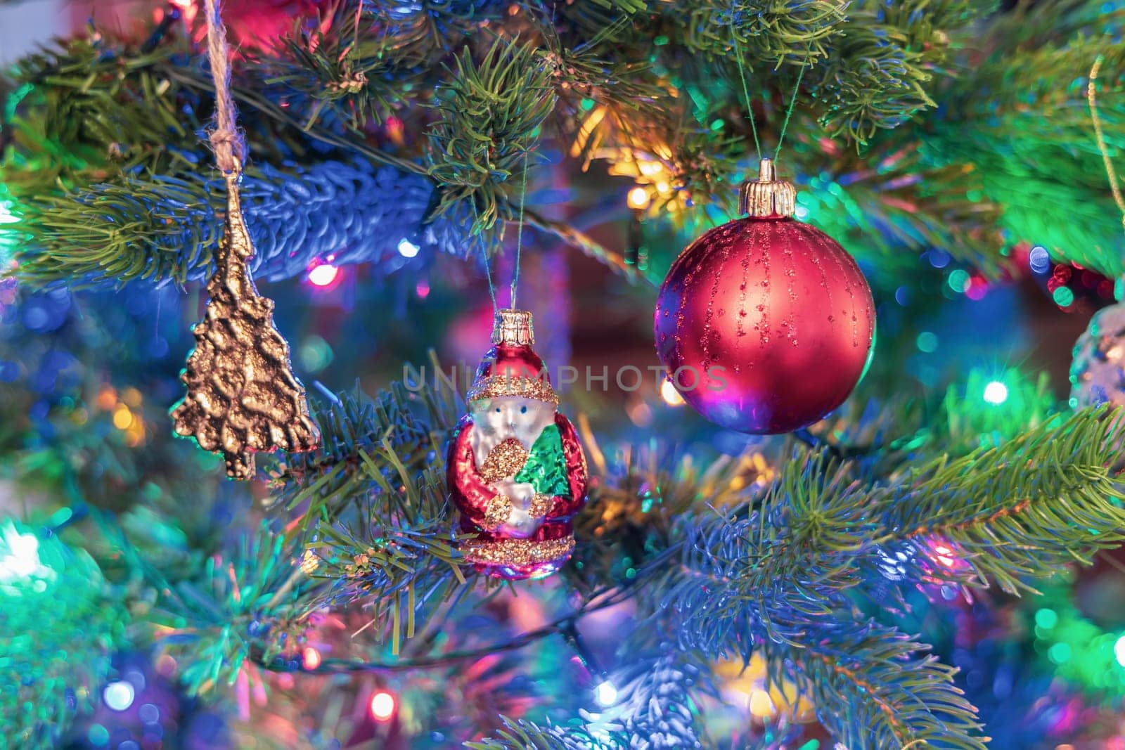 Christmas tree decorated with balls and gerland. High quality photo