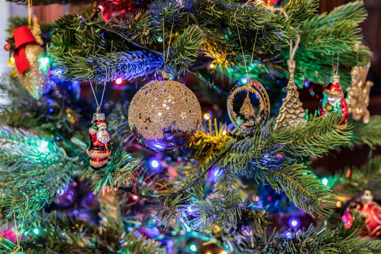 Christmas tree decorated with balls and gerland. High quality photo