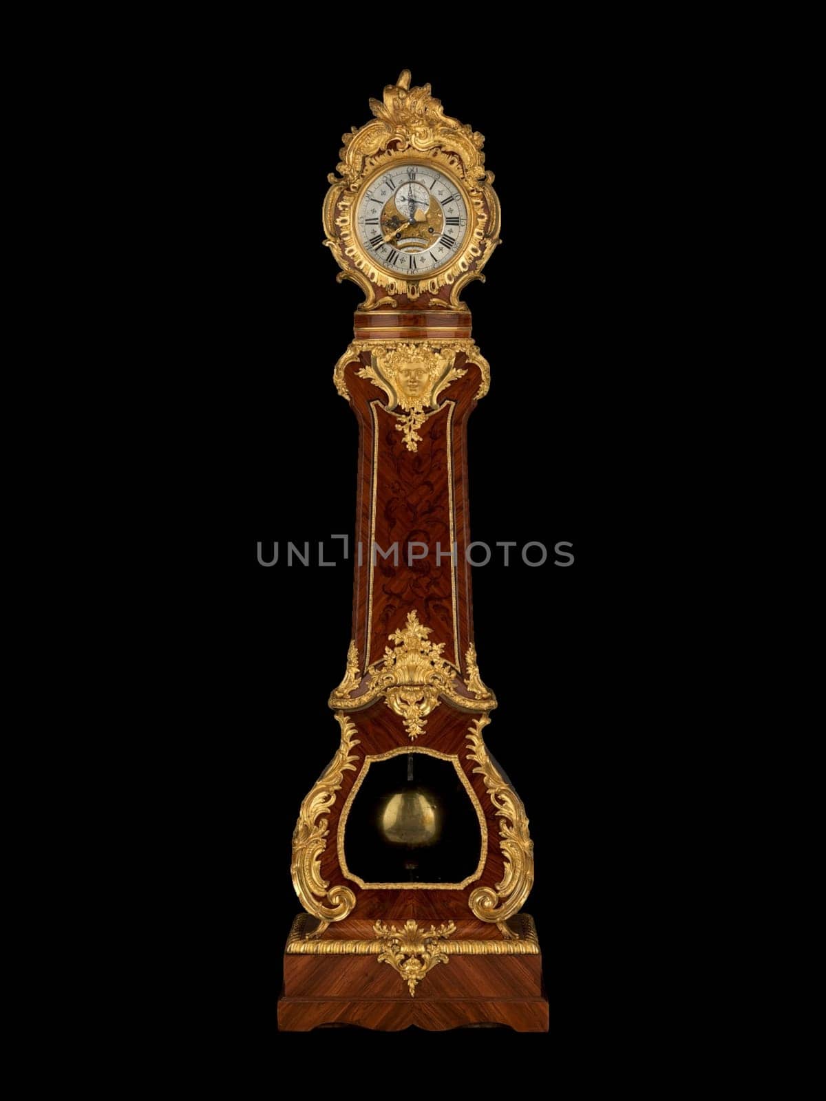 A close-up of an antique French longcase equation regulator by Ferdinand Berthoud, featuring intricate marquetry, gilded ormolu accents, and a graceful rococo design.
