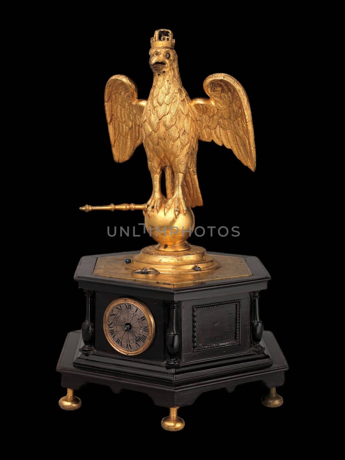 A close-up of an antique German automaton clock in the form of an eagle, crafted in Augsburg around 1630, with intricate details and a mechanical movement