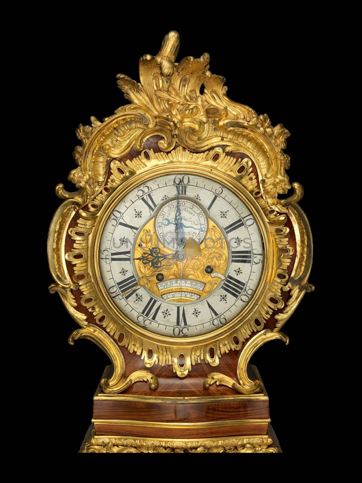 A close-up of an antique French longcase equation regulator by Ferdinand Berthoud, featuring intricate marquetry, gilded ormolu accents, and a graceful rococo design.
