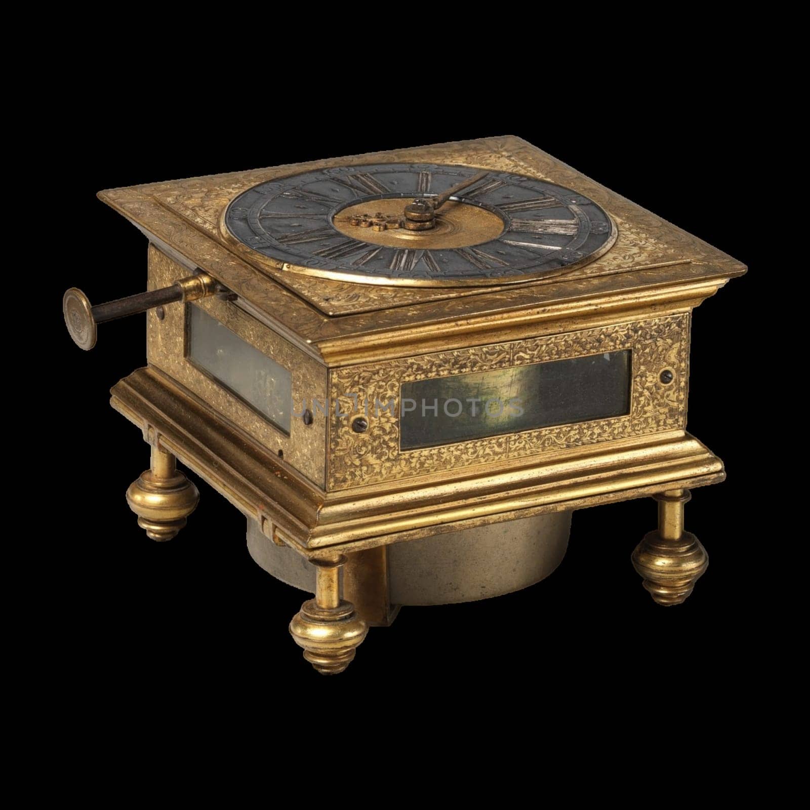 An antique gilded table clock by Johann Kleinschmidt, circa 17th century. The clock features a lavishly gilded brass frame with intricate details.
