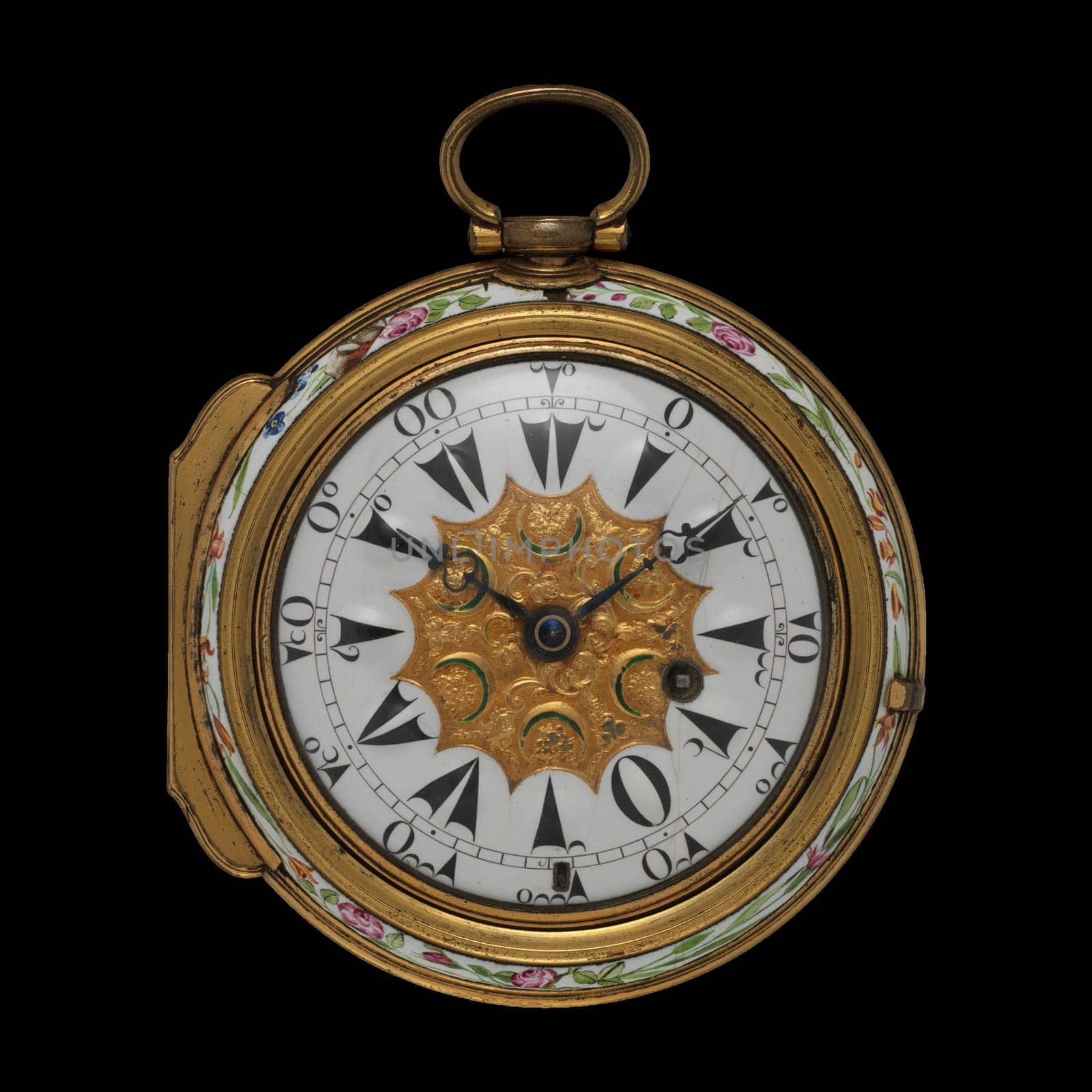 Antique gold clock watch with enamel and floral design.