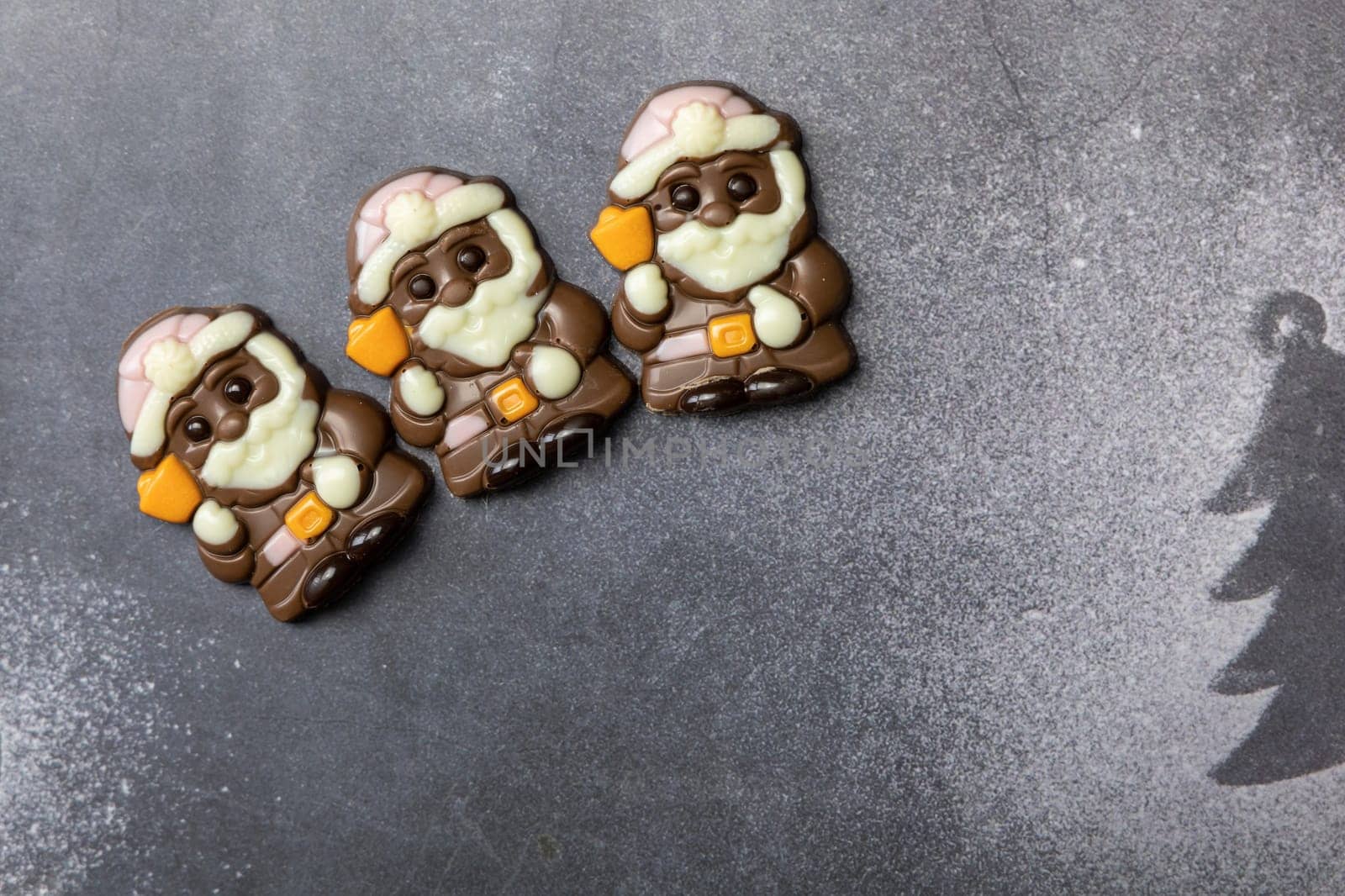 Christmas chocolates. Chocolate Santa Claus. High quality photo