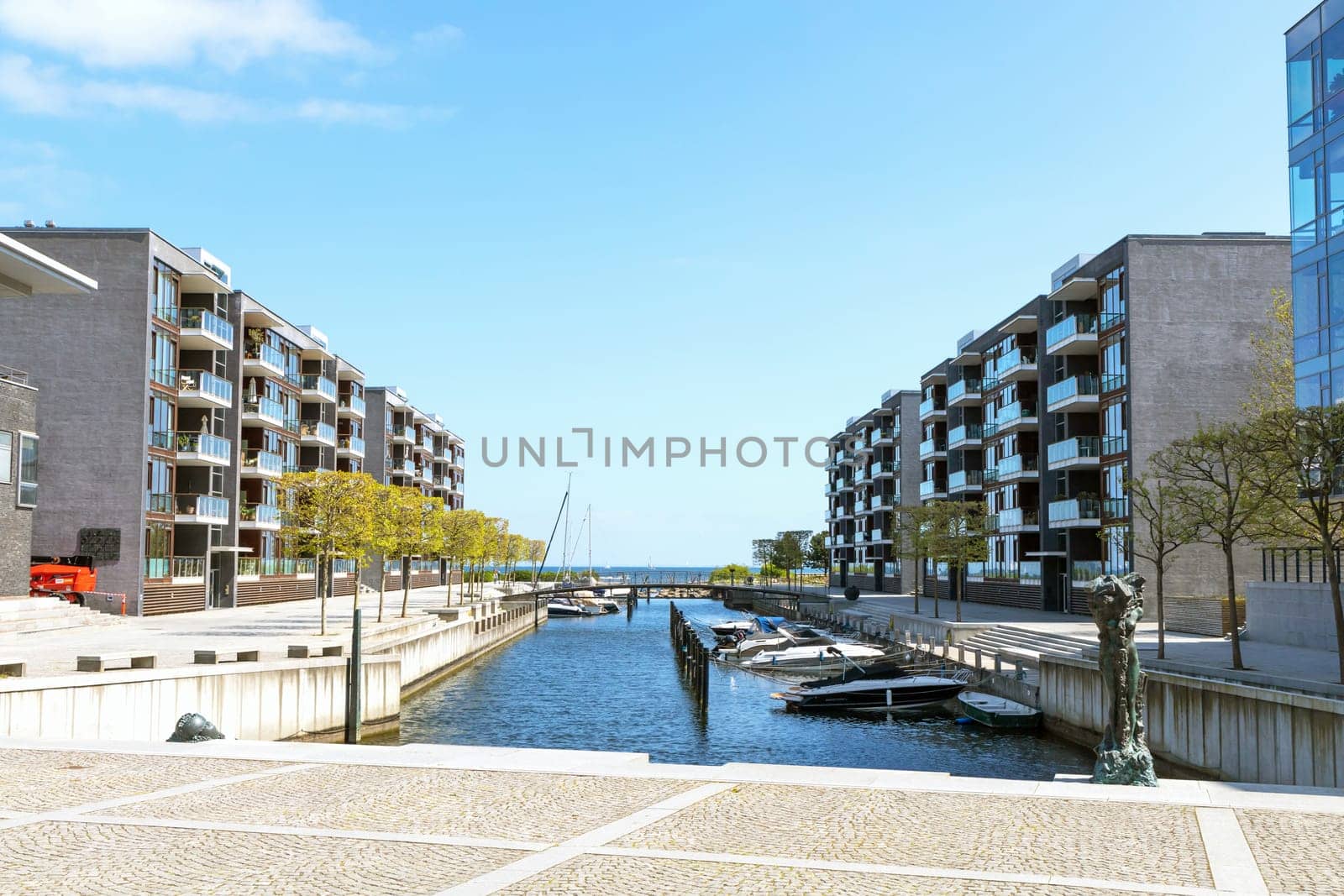 Modern area of the city with residential buildings. Real estate investment. Expensive housing. Copenhagen, Denmark - 30 June, 2023.