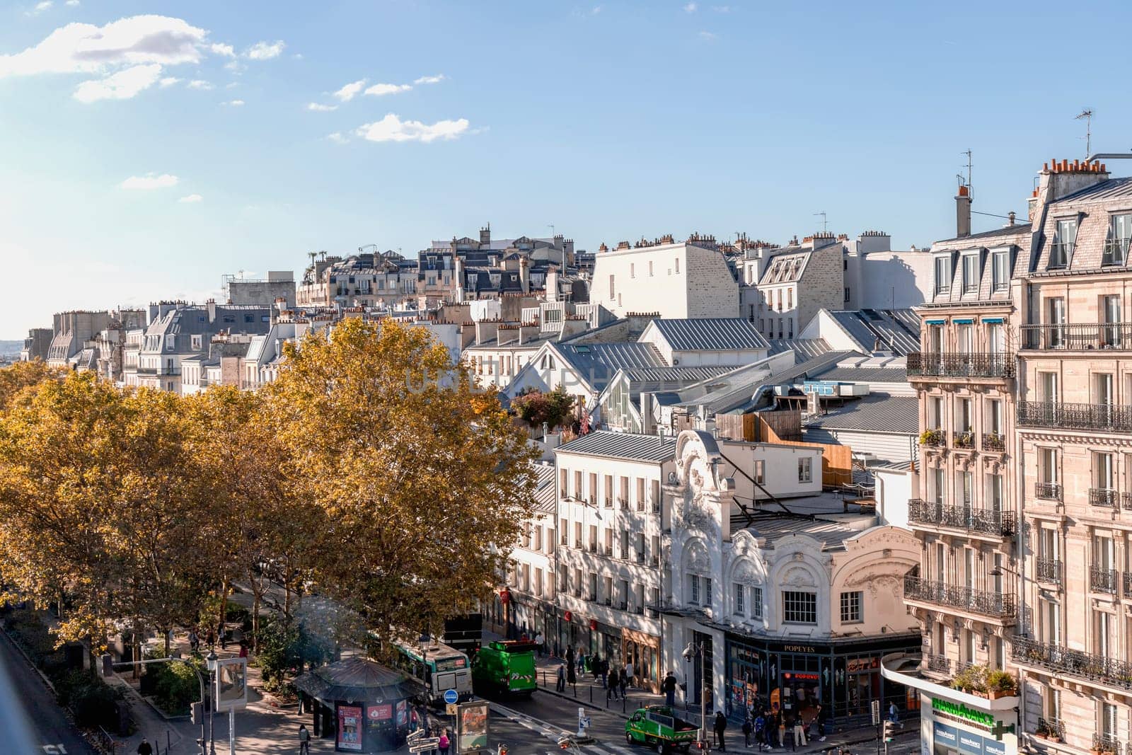View to the streets of Montmartre and roofs of buildings in Paris, France. Paris, France - October 25, 2024