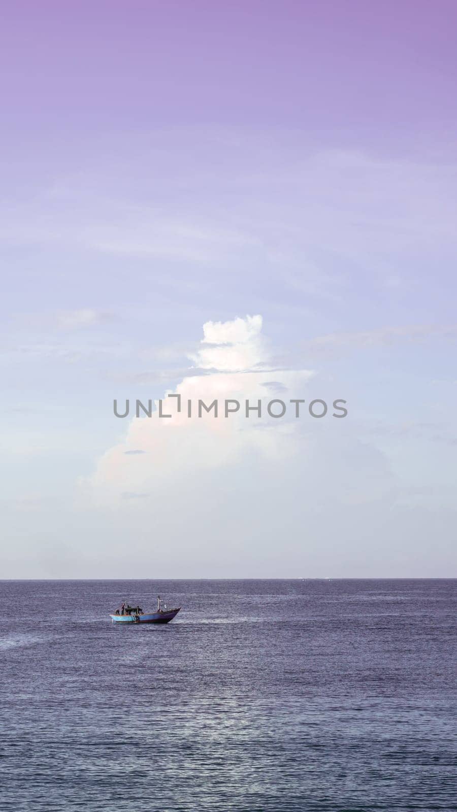 Sea sky cumulus cloud landscape view background. Calm water alone fishing boat. Destination aim progress concept.