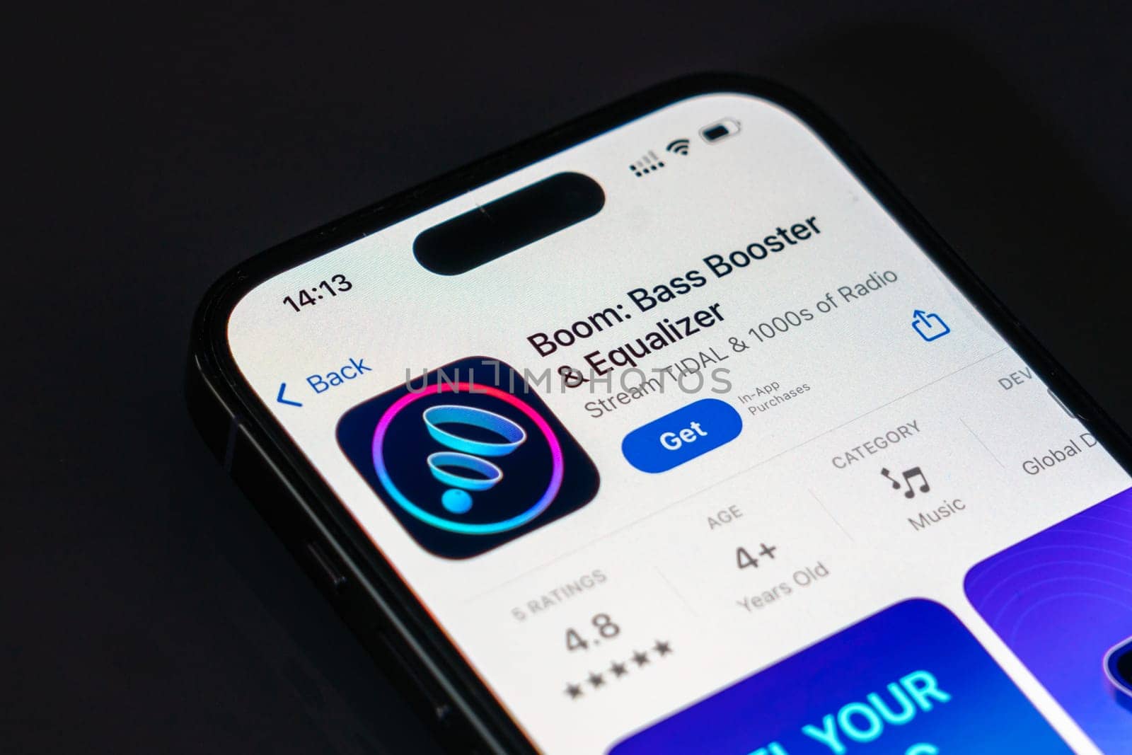 New York, USA - December 20, 2024: Boom app displayed on smartphone screen with logo. Music equalizer application offering bass boosting and sound enhancement features