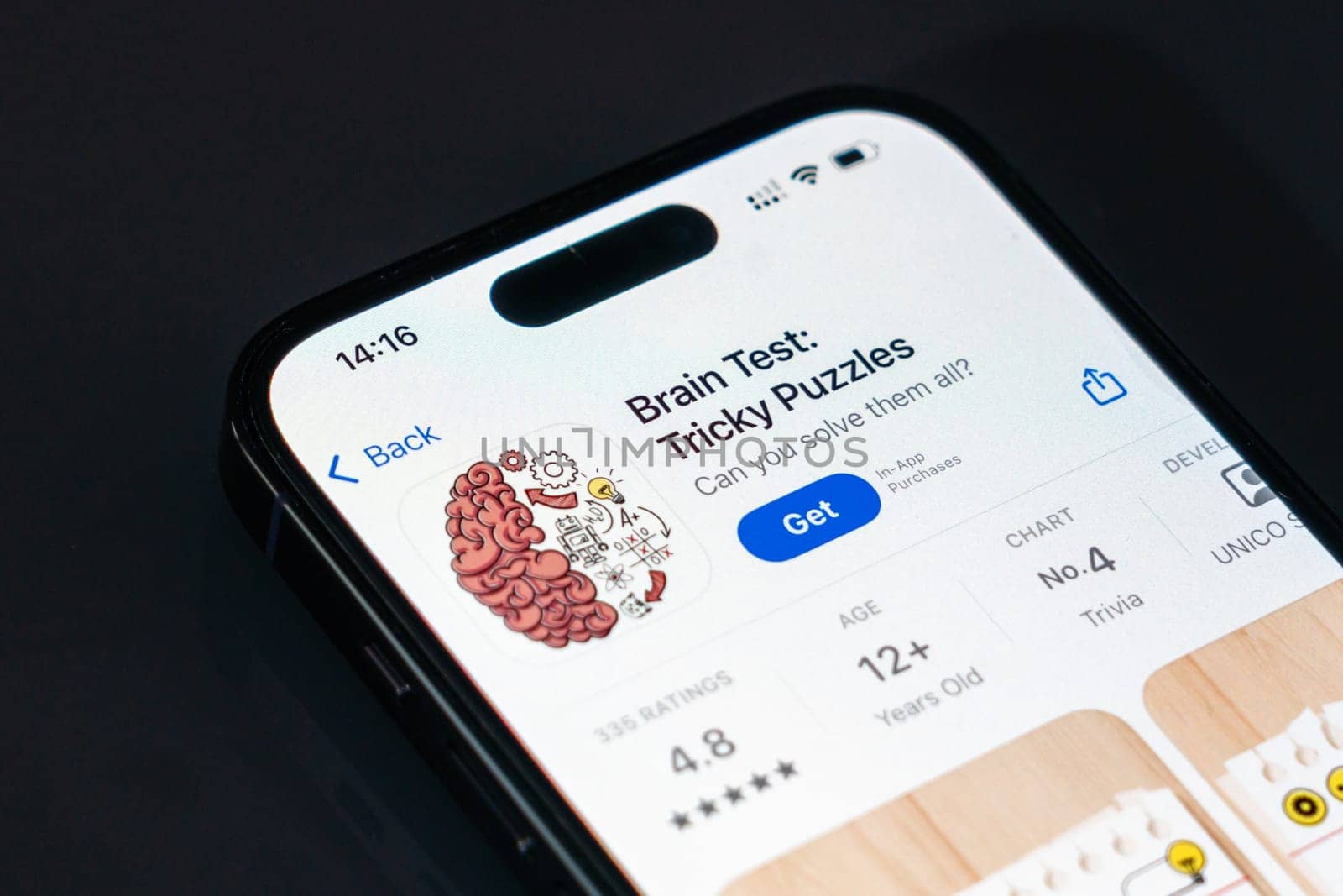 New York, USA - December 20, 2024: Brain Test game app displayed on smartphone screen with logo. Engaging puzzle game featuring tricky challenges and fun riddles