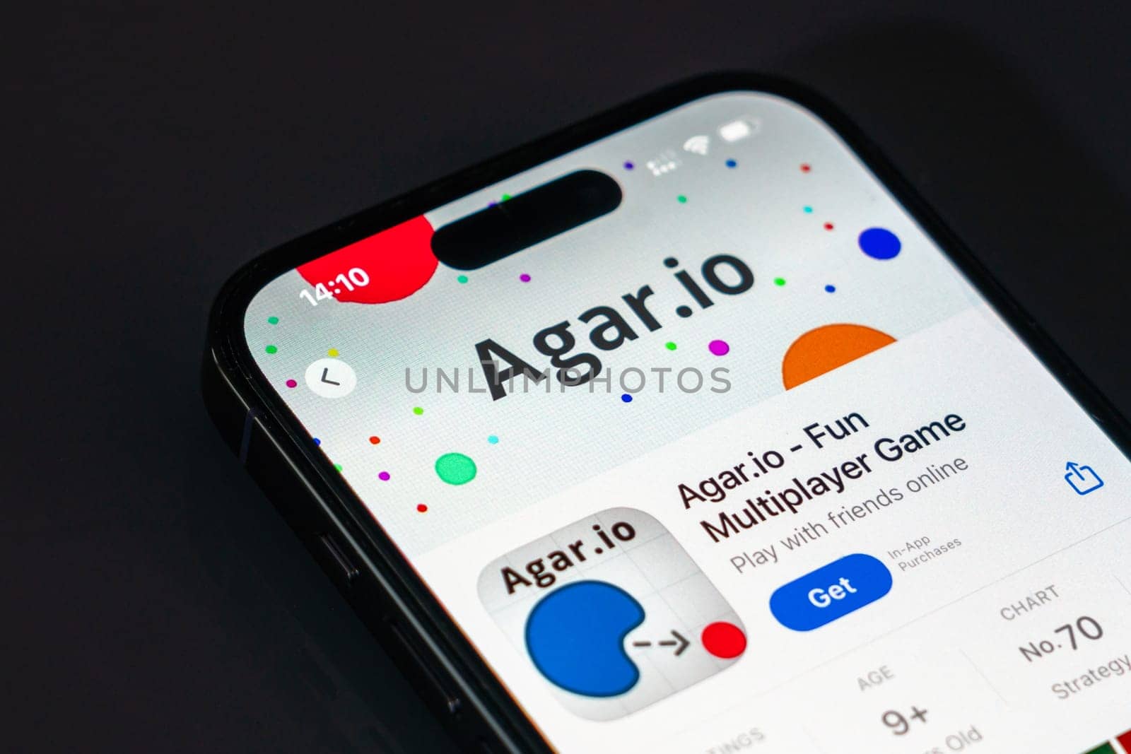 New York, USA - December 20, 2024: Agar.io game app displayed on smartphone screen with logo. Popular multiplayer game focused on strategy and competitive gameplay