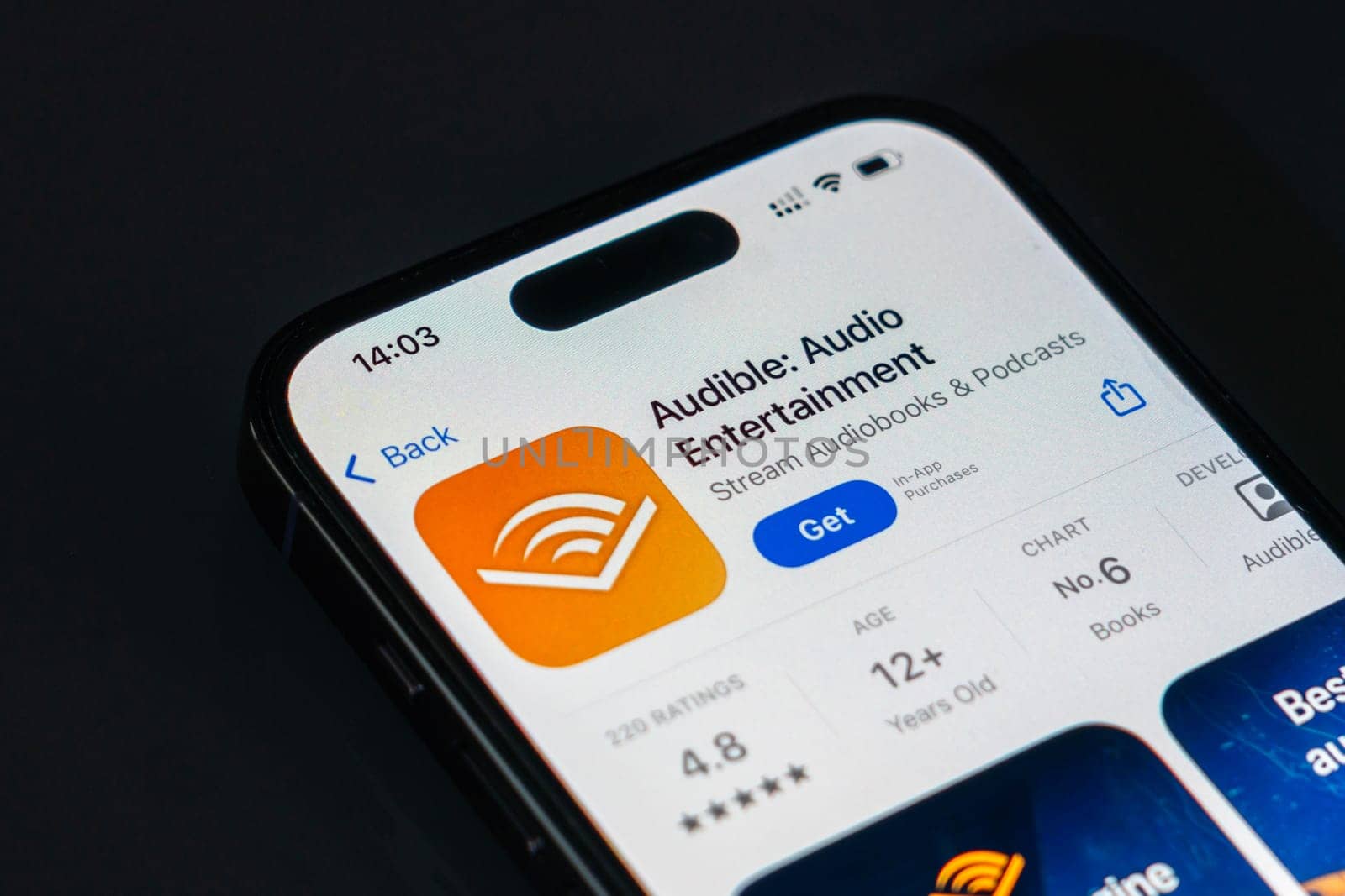 New York, USA - December 20, 2024: Audible app displayed on smartphone screen with logo. Audio entertainment application offering audiobooks, podcasts, and exclusive content