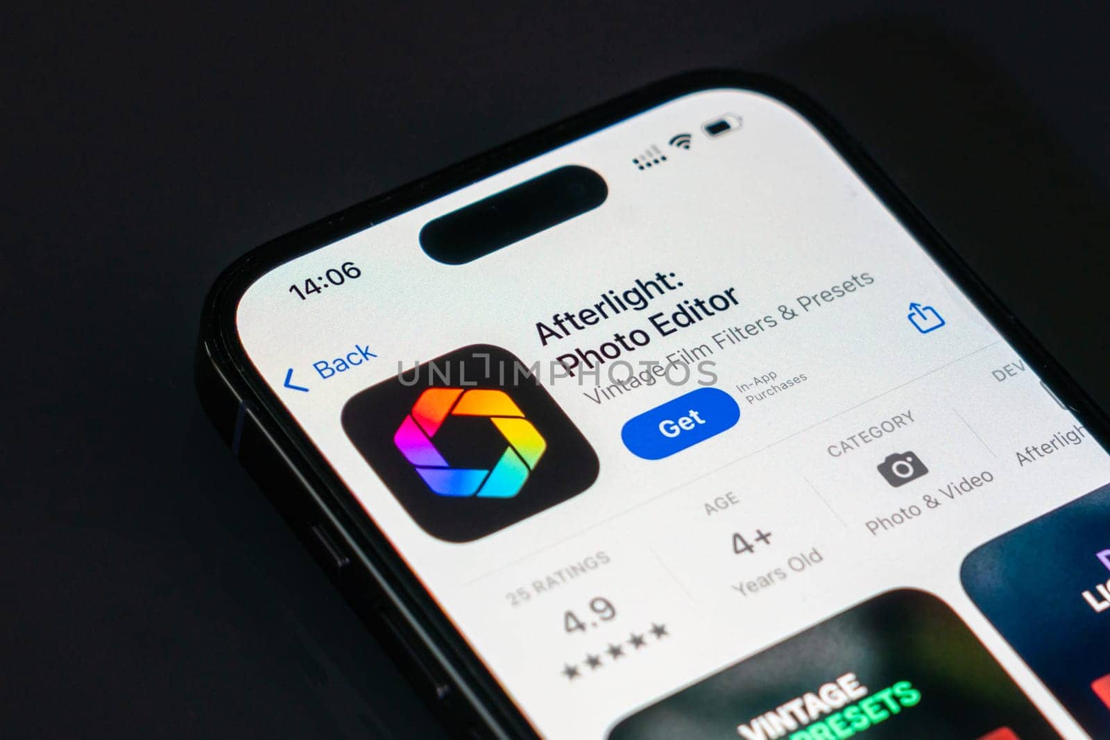 New York, USA - December 20, 2024: Afterlight photo editor app displayed on smartphone screen with logo. Mobile application offering advanced photo editing tools and creative effects