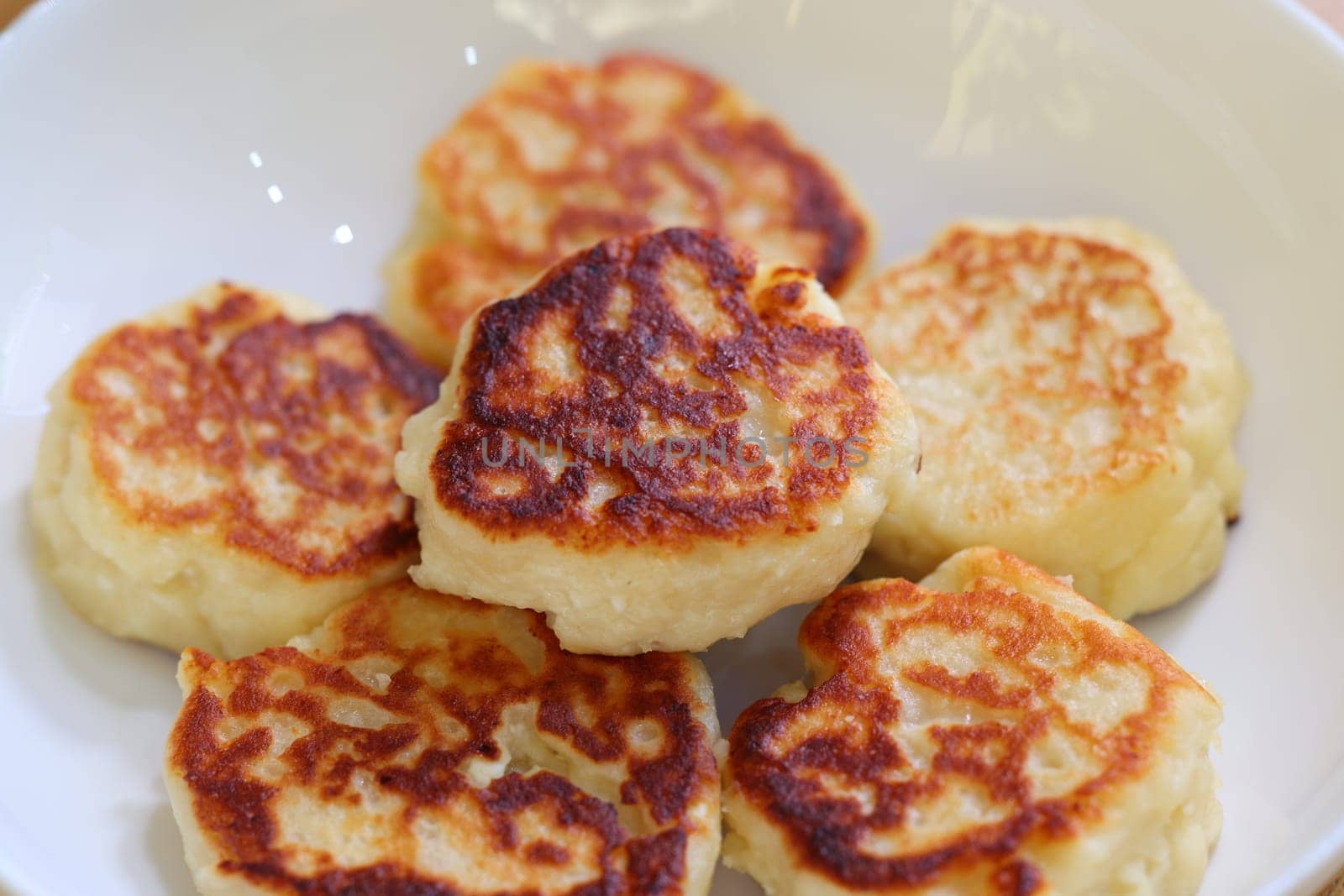 Delicious potato pancakes, golden brown and crispy, perfect for breakfast or a tasty snack any time