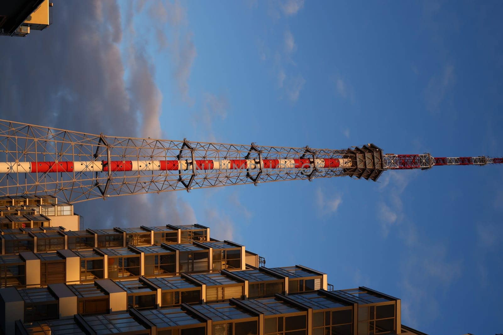 A stunning and breathtaking view of a communication tower beautifully set against a vivid evening sky backdrop