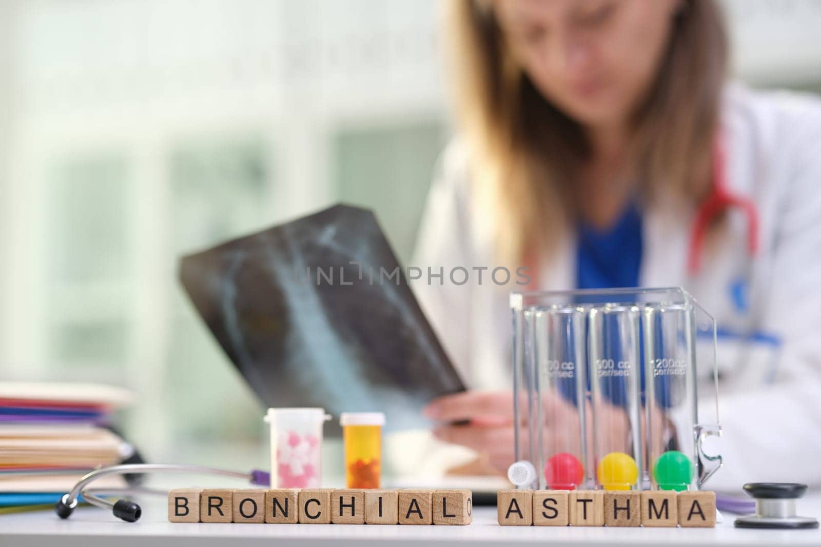A skilled healthcare professional is meticulously analyzing bronchial asthma by using Xray and various lab tools