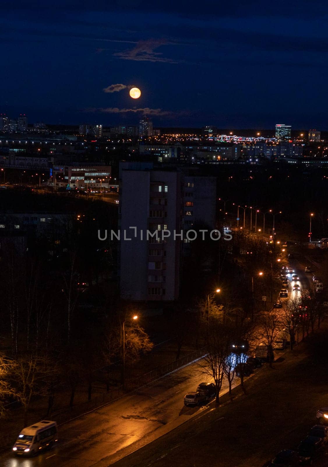 Cars moving on the night road.