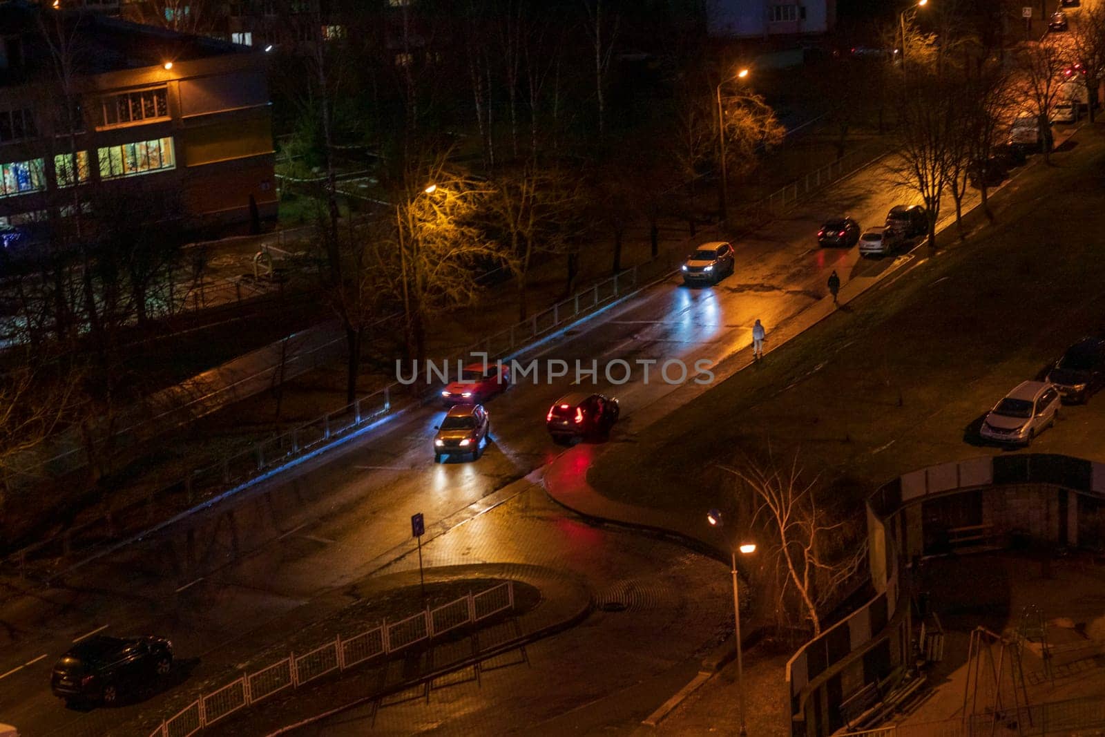 Cars moving on the night road.