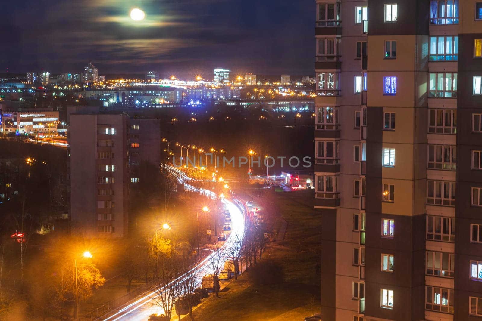 Cars moving on the night road.