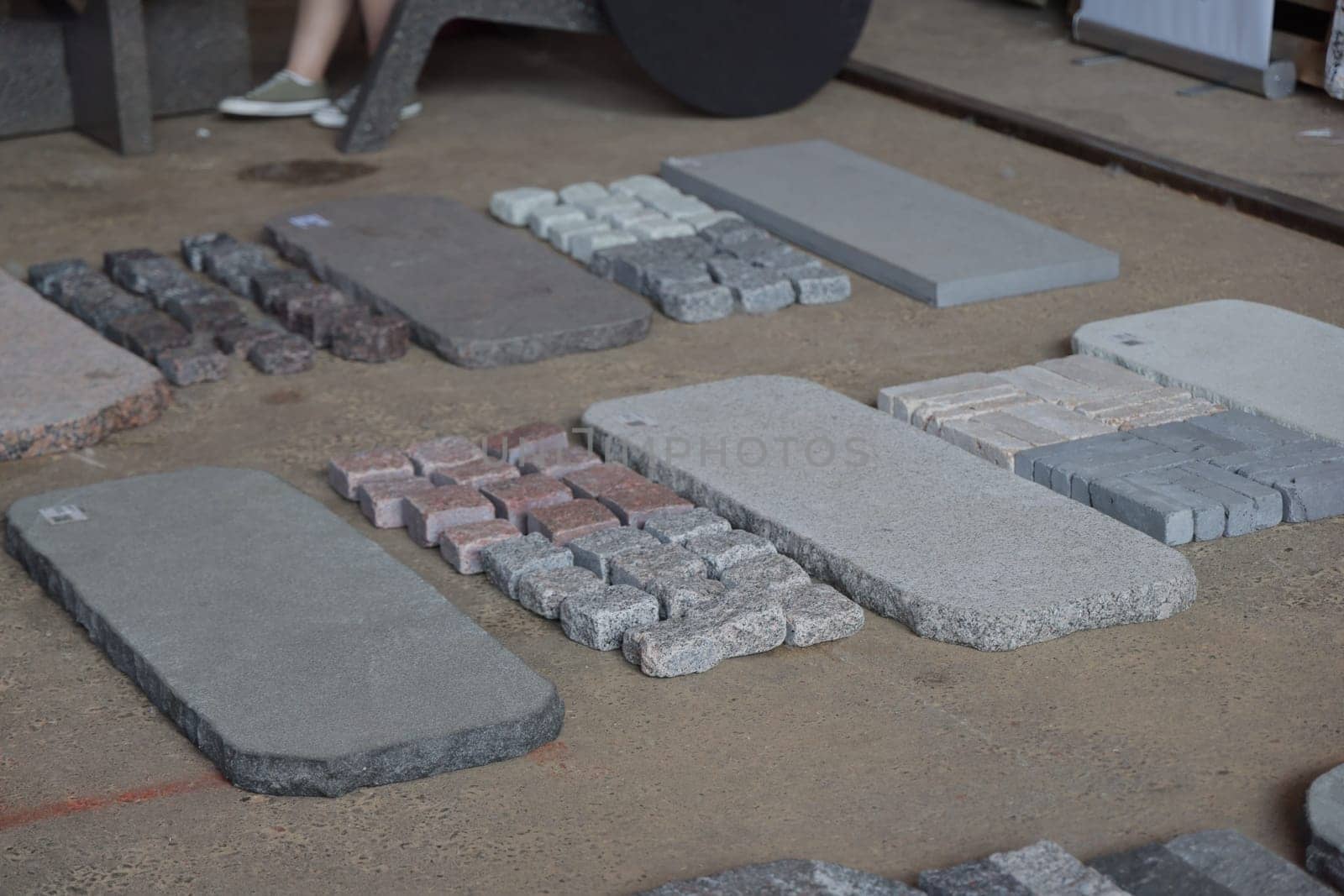 A comprehensive collection of stone and paver samples, beautifully showcasing an array of different textures and colors