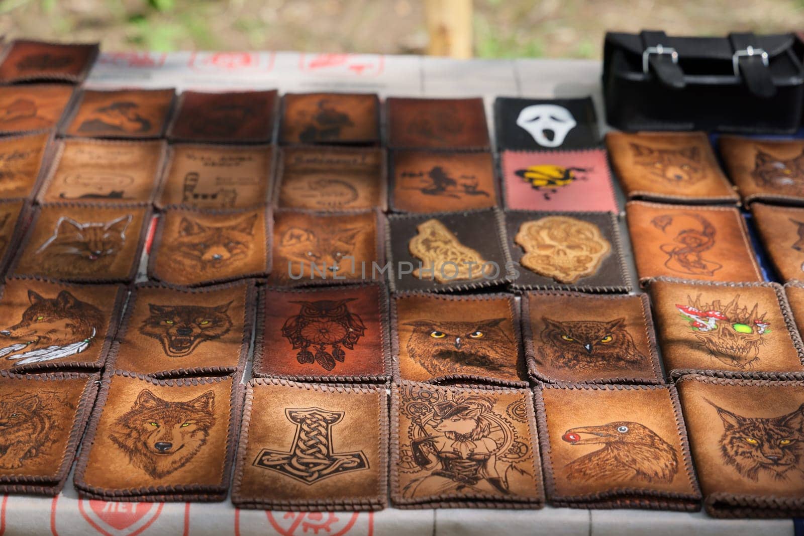 Discover an extensive collection of unique handcrafted leather patches that showcase intricate engravings and patterns