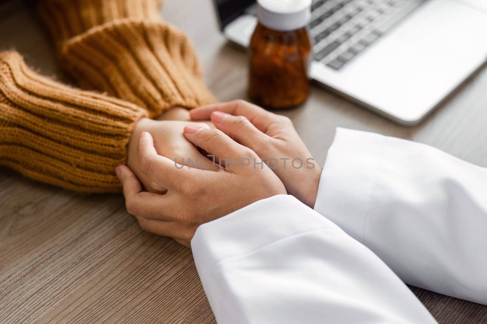 A female doctor offering expert health advice to a patient, showcasing professionalism and care in a modern medical environment.