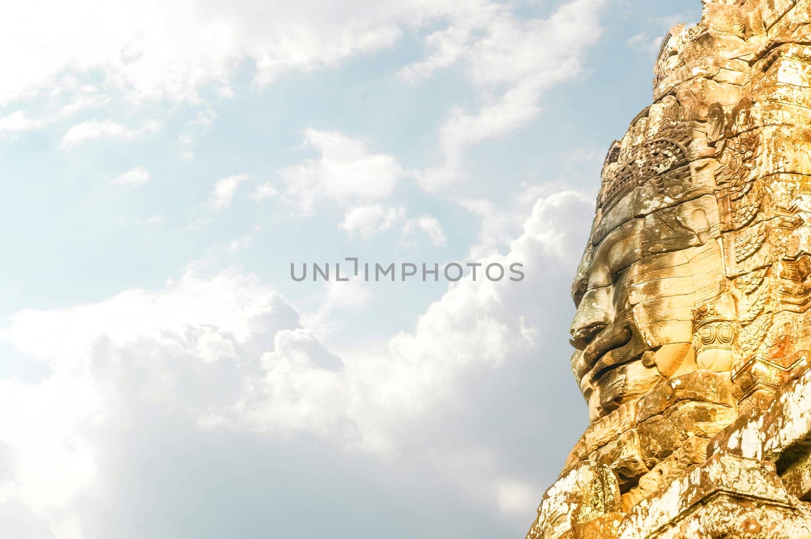 The face of the Temple of Bayon Nakhon Thom by day, Angkor, Siem Reap, Cambodia
