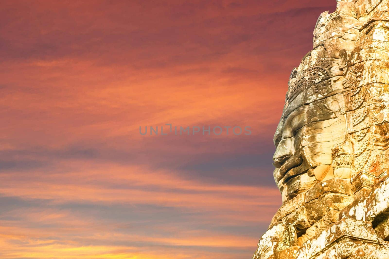 The face of the Temple of Bayon Nakhon Thom by sunset, Angkor, Siem Reap, Cambodia