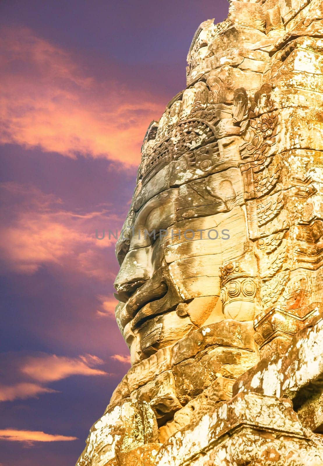 The face of the Temple of Bayon Nakhon Thom by sunset, Angkor, Siem Reap, Cambodia