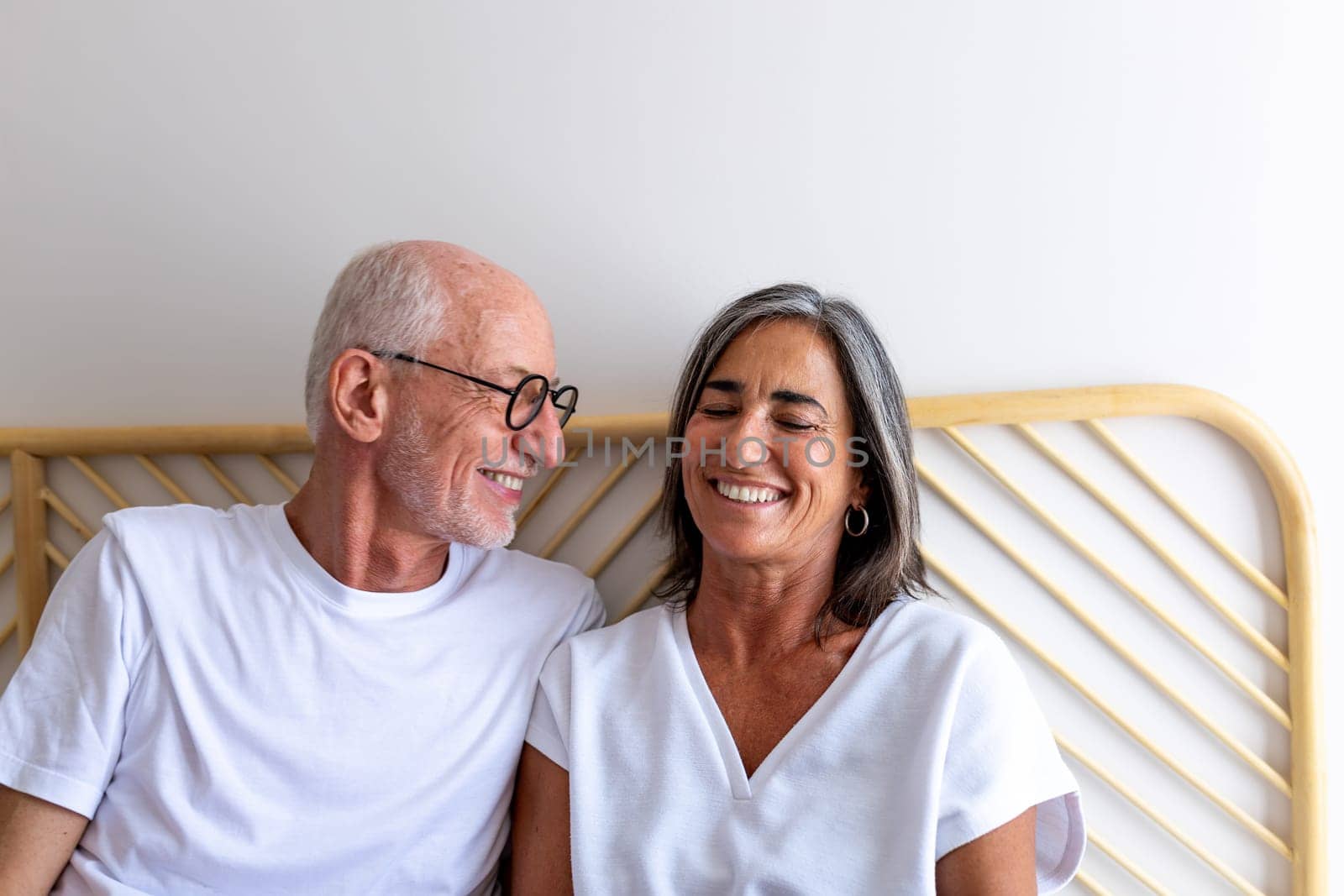 Happy mature caucasian couple in love laughing together. Happiness concept.