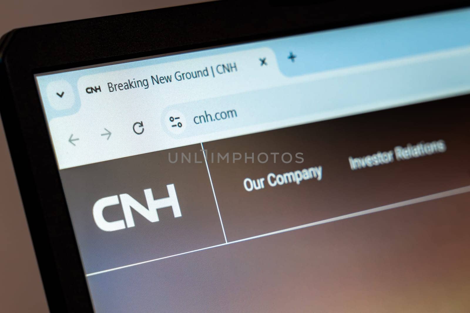 New York, USA - December 21, 2024: Close-up view of CNH Industrial website homepage showcasing agricultural and construction equipment solutions