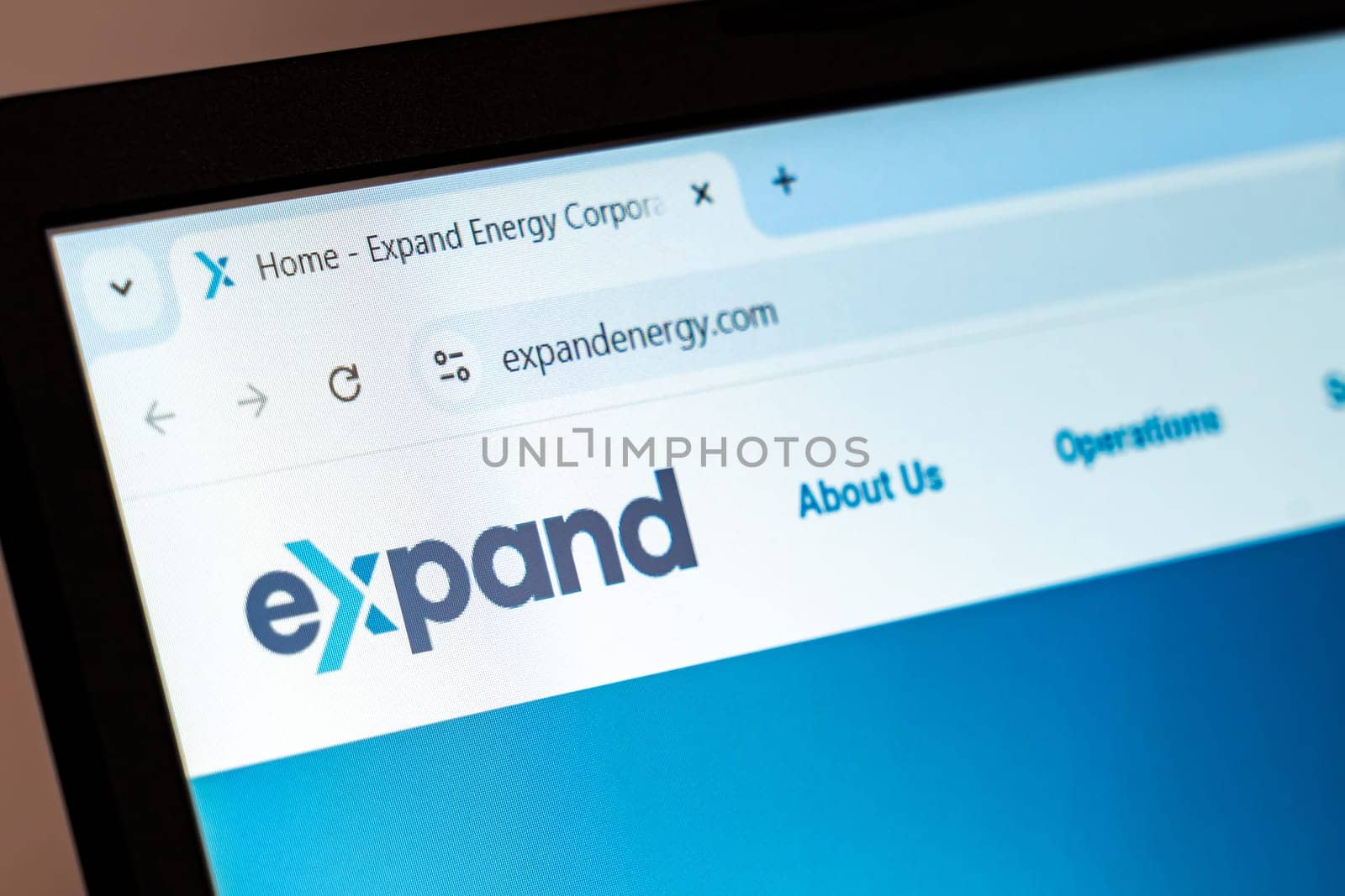 New York, USA - December 21, 2024: Expand Energy website homepage displayed on laptop screen with logo. Renewable energy company specializing in sustainable solutions and clean energy technologies