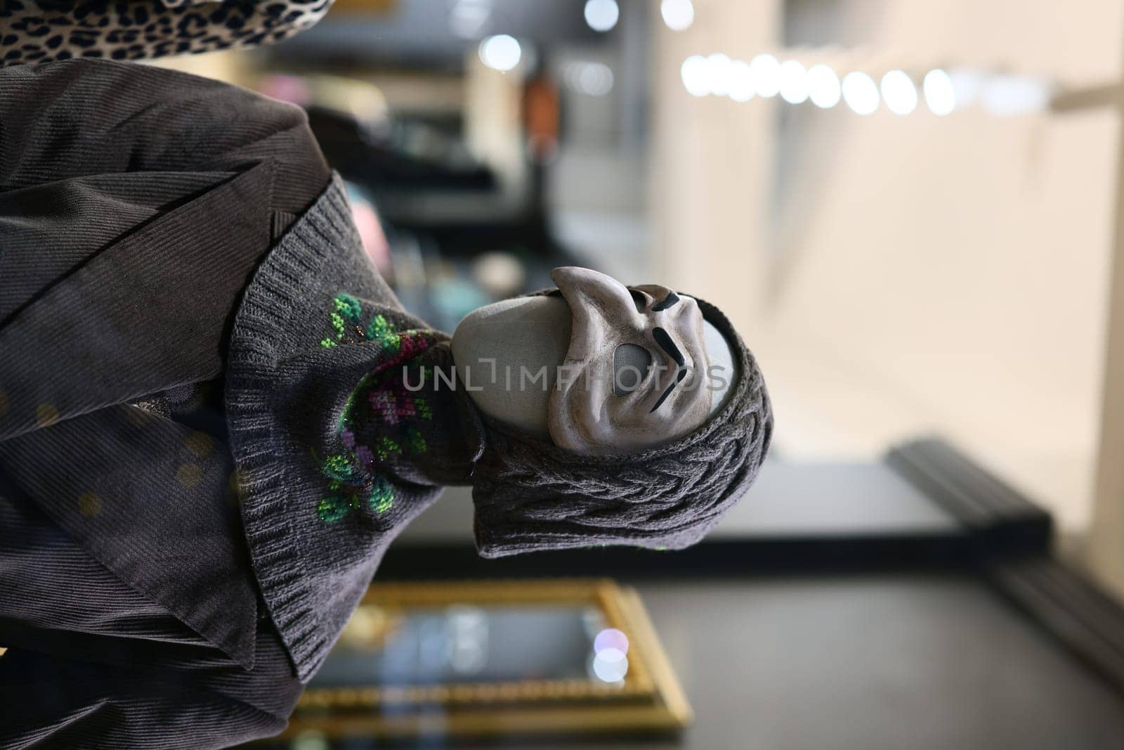 A fashionable and artistic mask that showcases a stunning blend of traditional influences and modern design elements