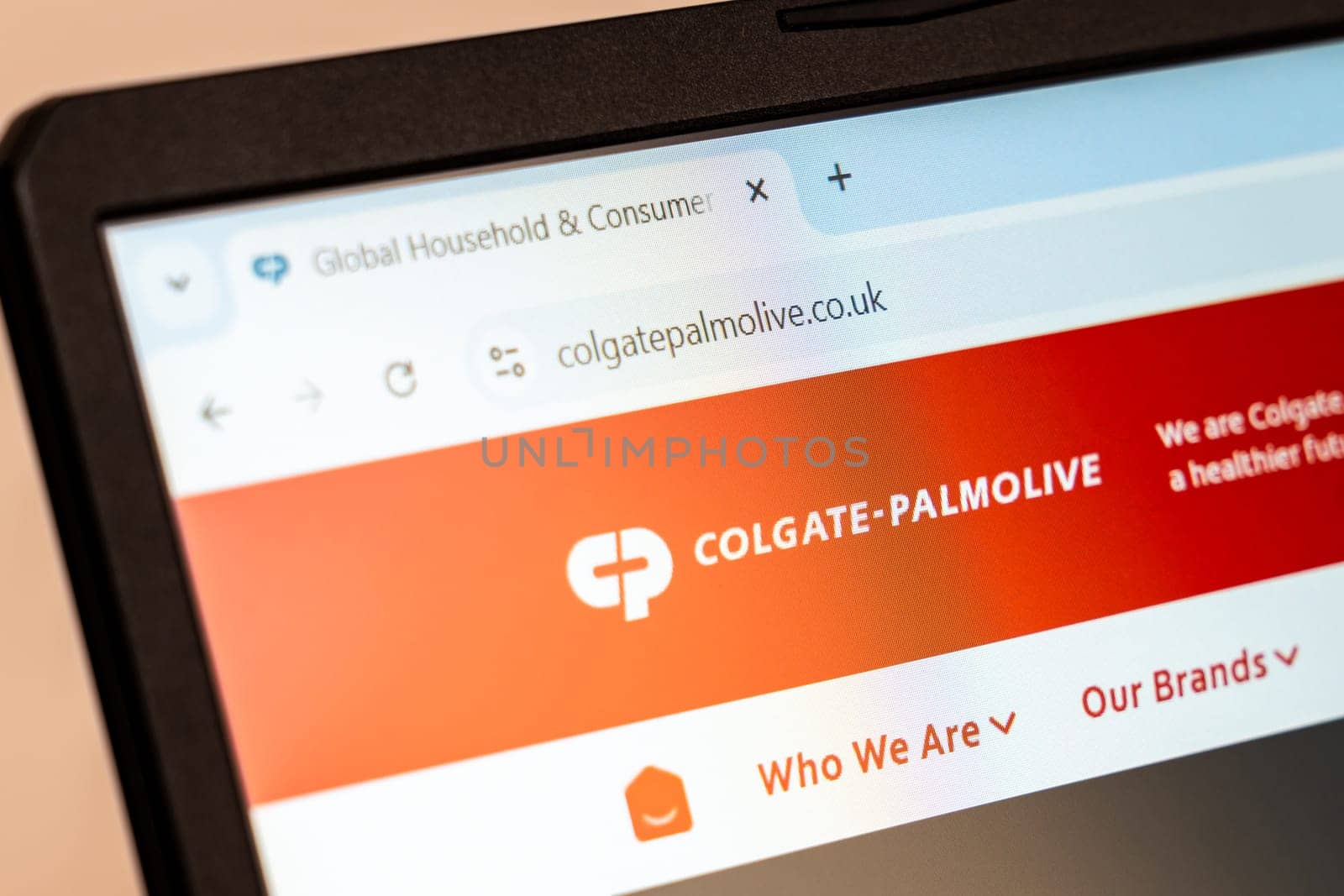 New York, USA - December 21, 2024: Colgate-Palmolive website homepage displayed on laptop screen with logo. Global consumer products company offering oral care, personal care, home care, and pet nutrition products