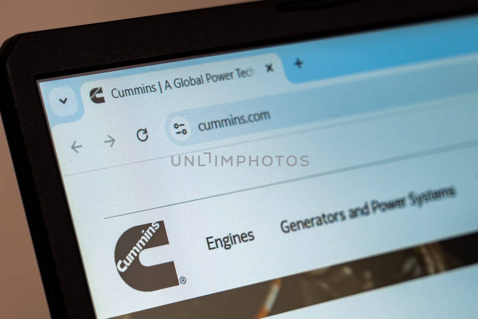 New York, USA - December 21, 2024: Cummins website homepage displayed on laptop screen with logo. Global manufacturer of engines, generators, and power systems