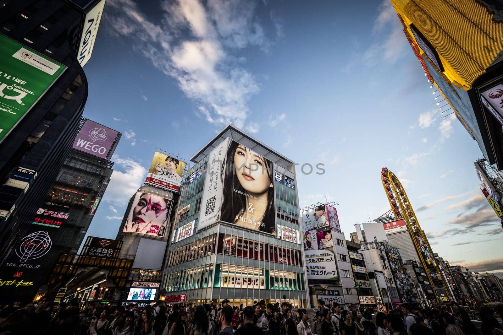 OSAKA, JAPAN - SEPTEMBER 26 2024: The view down Dotonbori River from Ebisubashi Bridge on a clear autumn day in Osaka, Japan