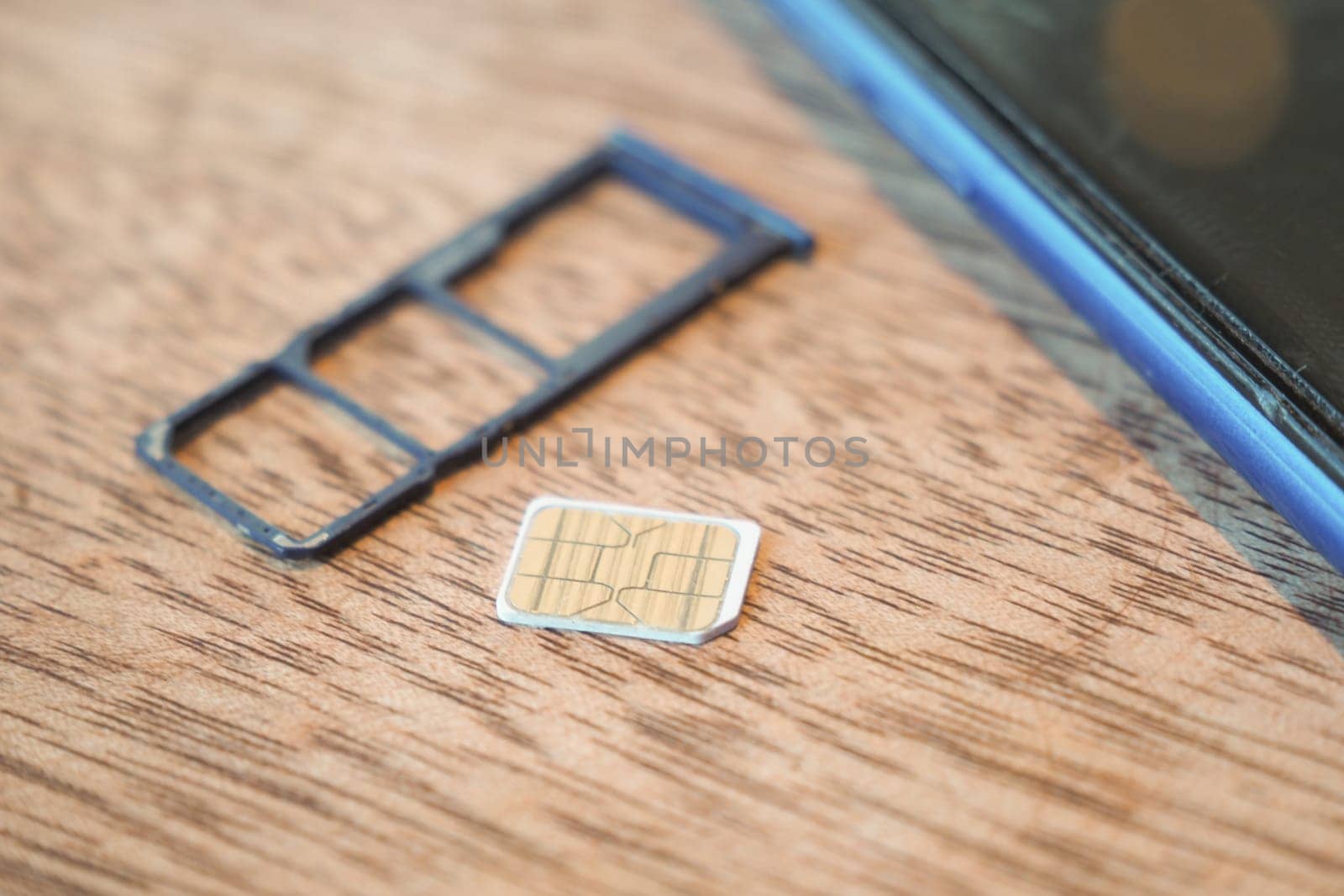 A sim card for a smart phone on table .