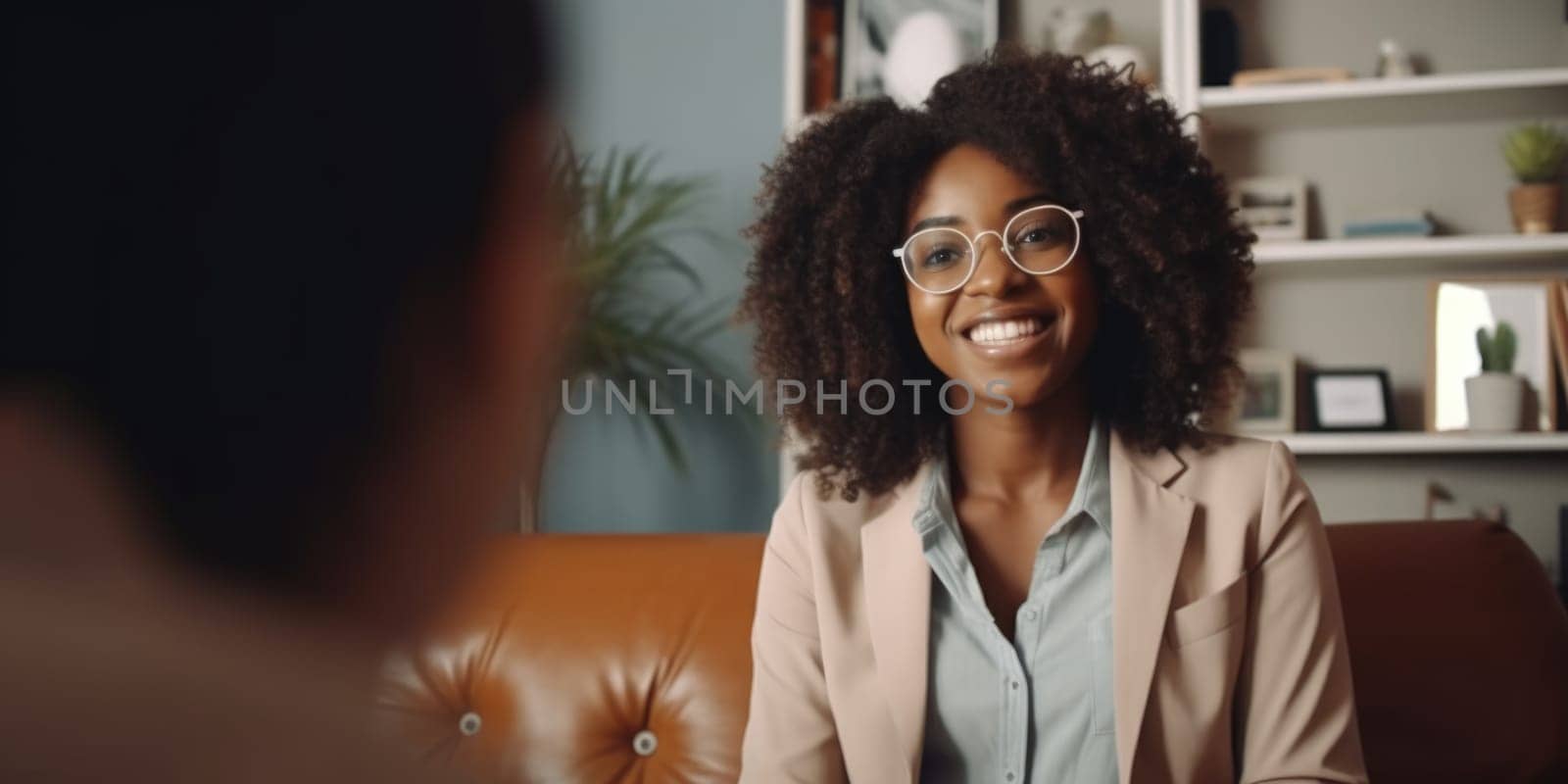 Stylish confident adult 30 years old african american female psychologist sitting arms crossed looking at camera. AI Generated