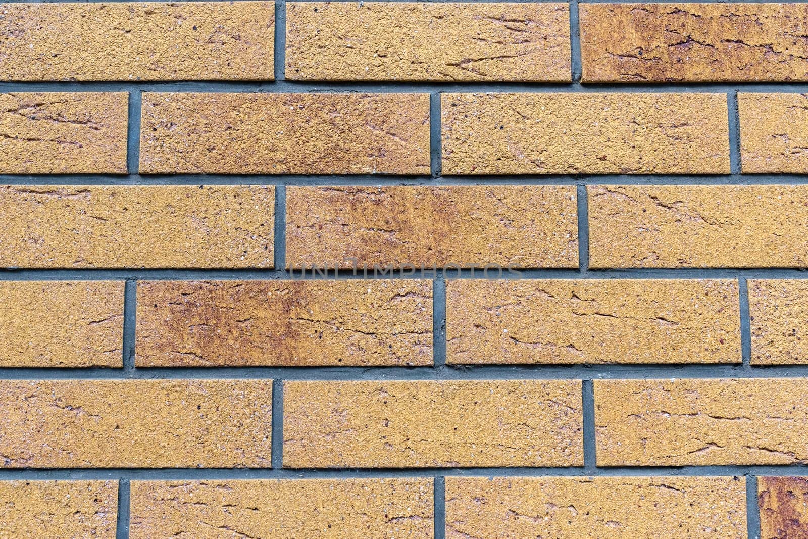 Close-up of a brick-shaped ceramic tile wall, texture or background, for further graphic work