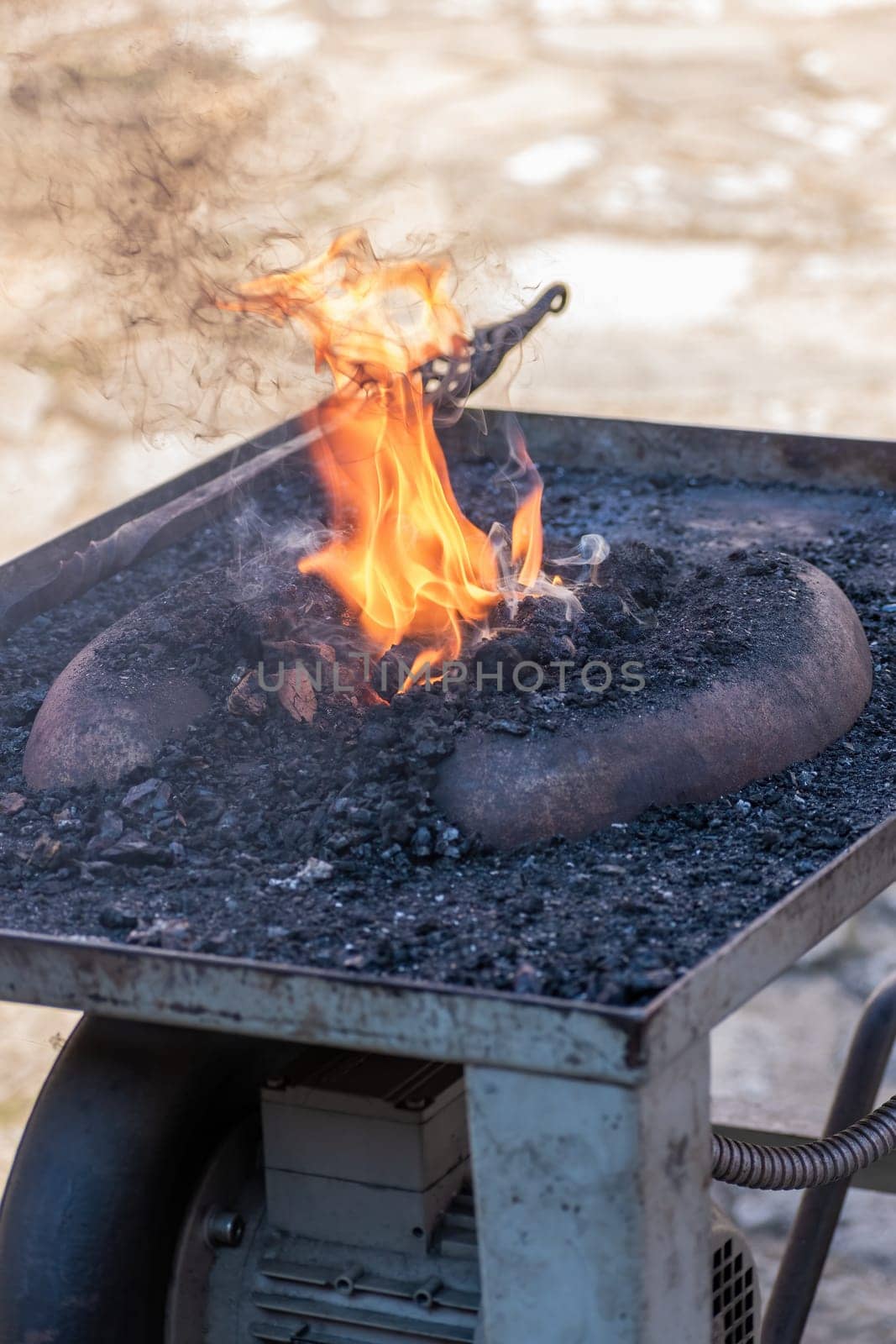 Mobile blacksmith forge for hand forging, demonstration of old crafts