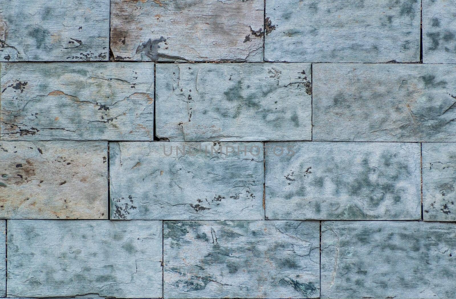 Area of ceramic tiles in the style of stone, as a texture or background for further graphic work