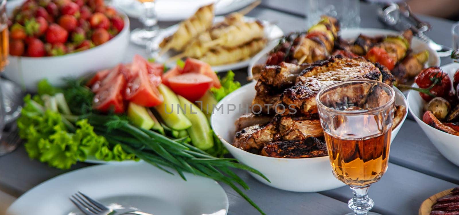 Vegetables and meat are grilled on the table. Selective focus. Food.