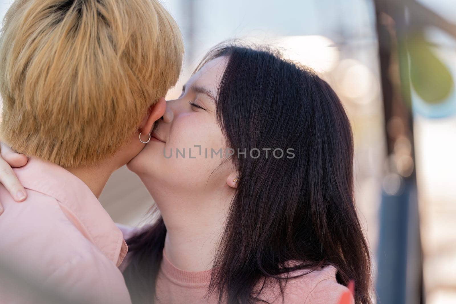 A sweet moment captured between a couple celebrating love on Valentine Day with a tender kiss.