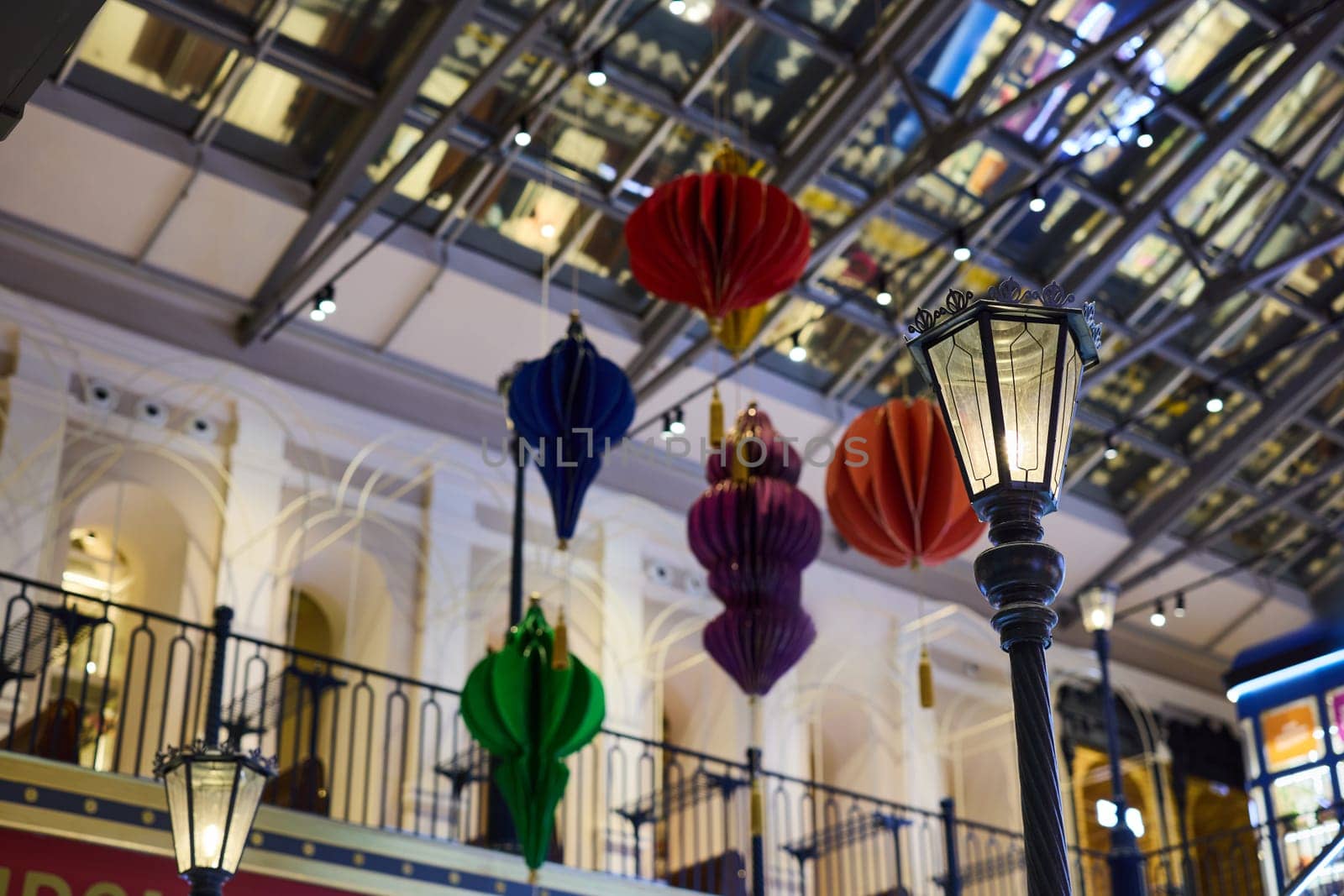 Vibrant paper lanterns and decorative lights significantly enhance the ambiance of an elegant shopping center