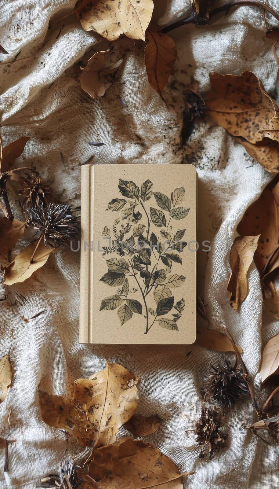 A die cut sticker with an eco-friendly theme decorates a kraft paper notebook. surrounded by dried leaves and earthy tones, the scene embodies an organic, natural aesthetic, perfect for sustainable living, journaling, or interior design inspiration.