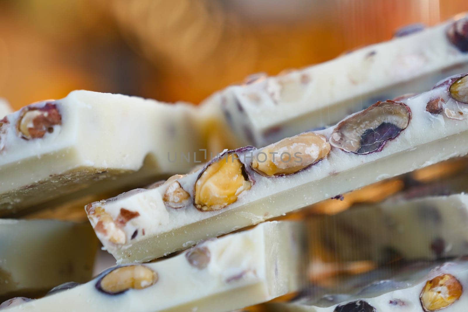 Sweet white nougat with mixed nuts, perfect for a variety of treats and desserts