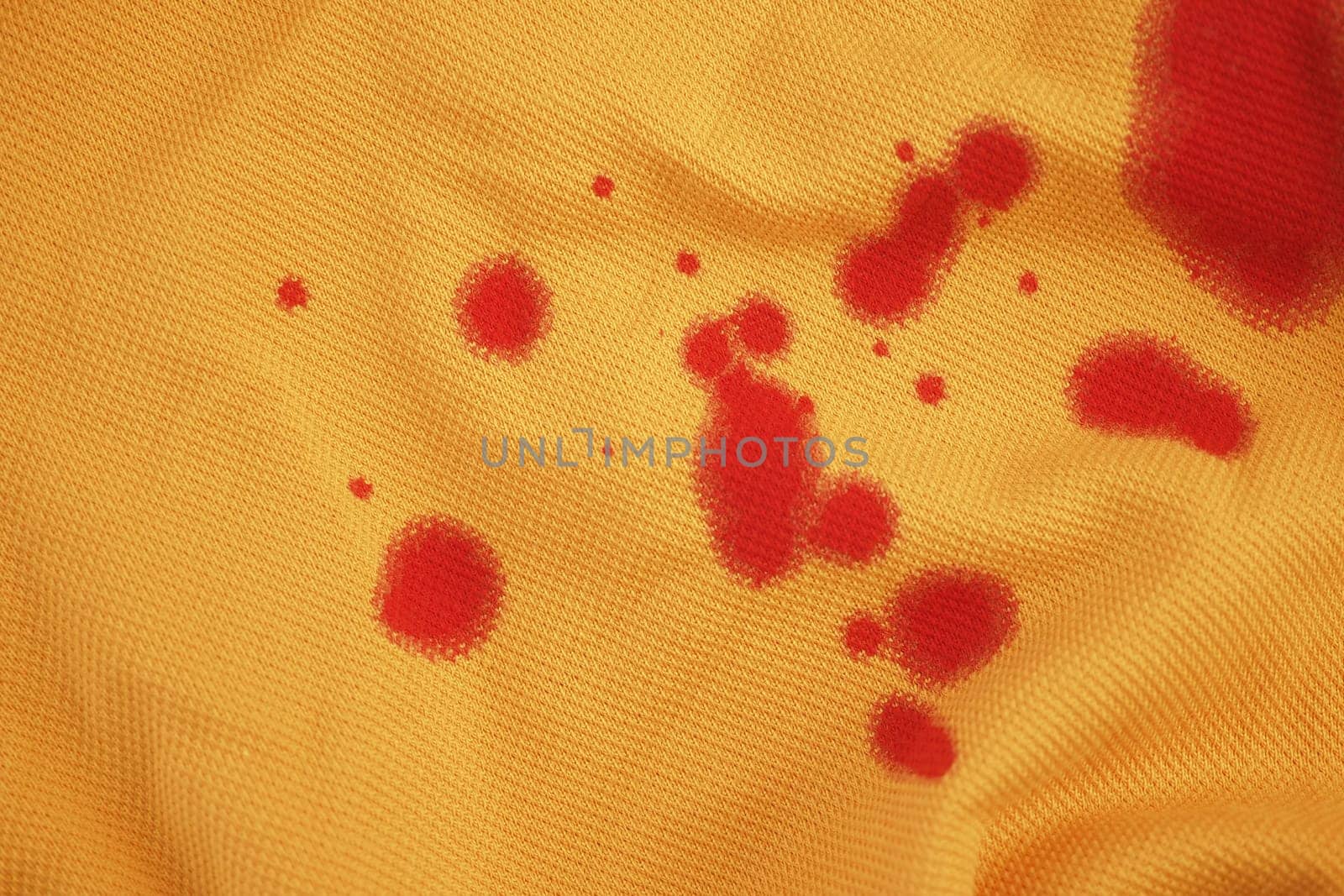 blood stains on a white shirt