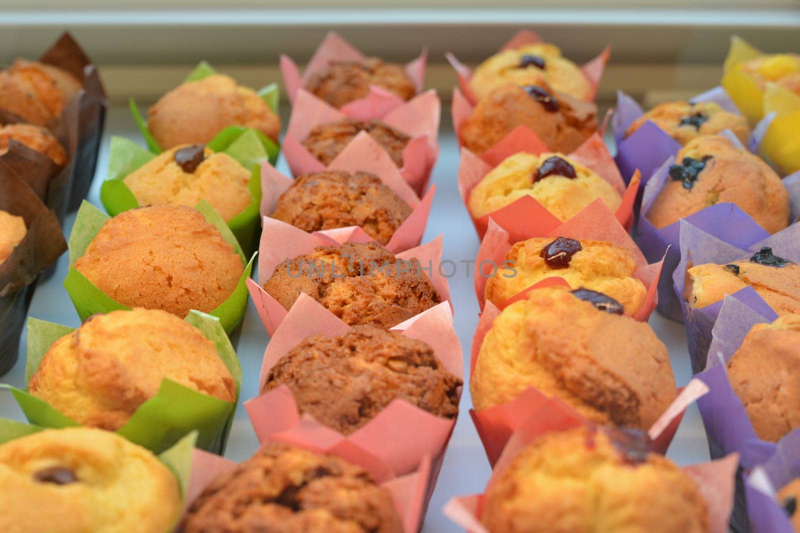 Multiple colorful nicely decorated muffins for sale