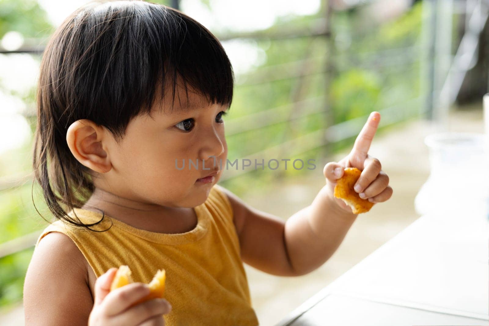 The Boy Pointed His Finger Forward. Boy shows his index finger.