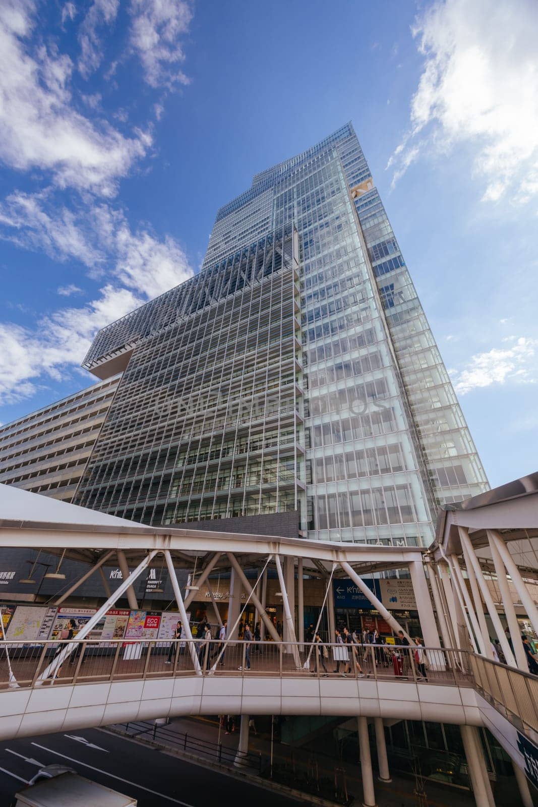 OSAKA, JAPAN - SEPTEMBER 26, 2024: Exterior architectural views of Abeno Harukas from Abiko-Suji St. Abeno Harukas is one of the tallest buildings in Japan