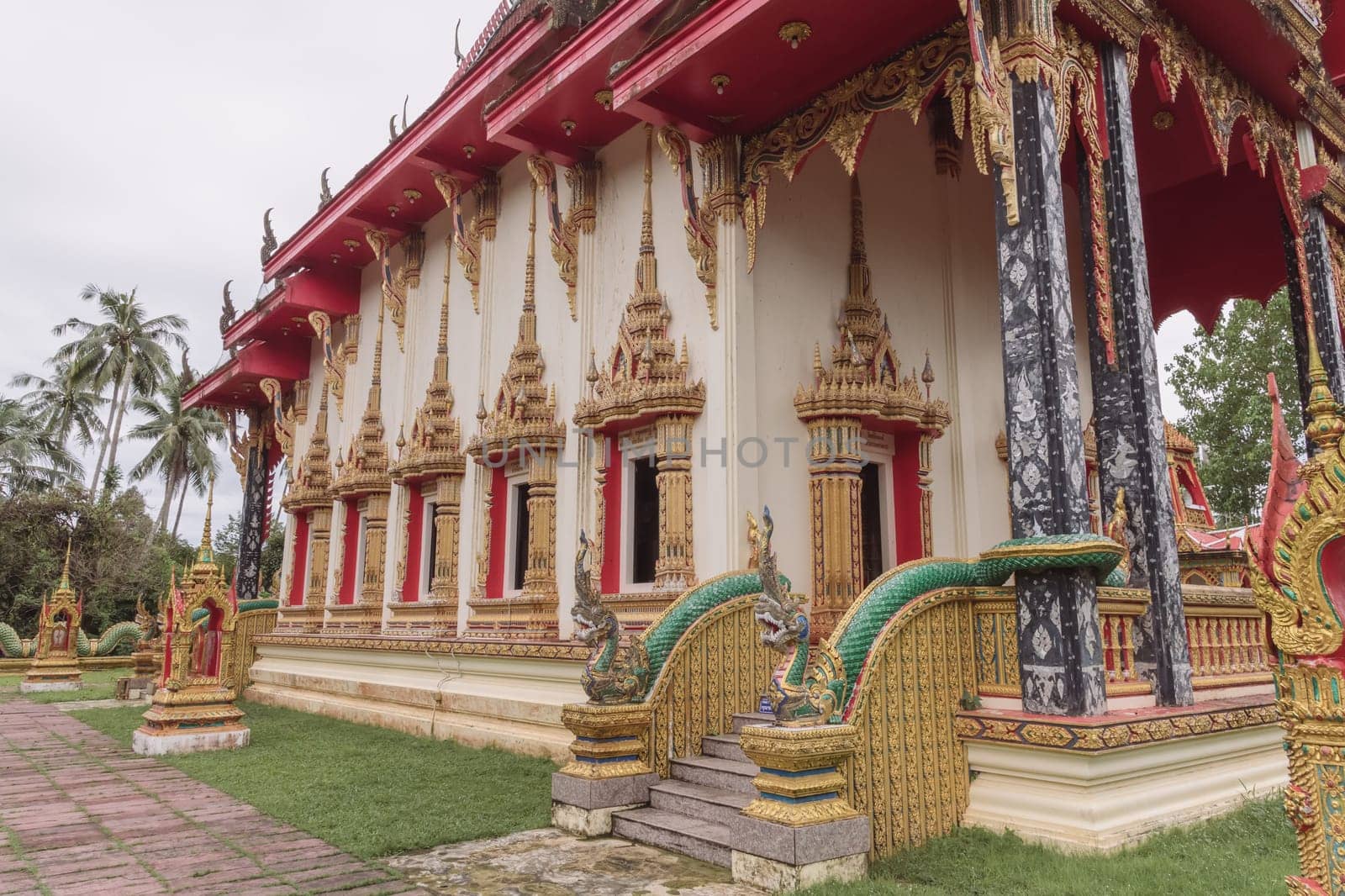 A breathtaking and stunning view of a traditional Thai temple that is beautifully adorned with intricate decorations